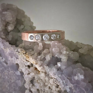 Modern Simplicity: Five-Diamond Rose Gold Ring