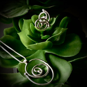 Spiral Trajectory: Coiled Rose Stud Earrings