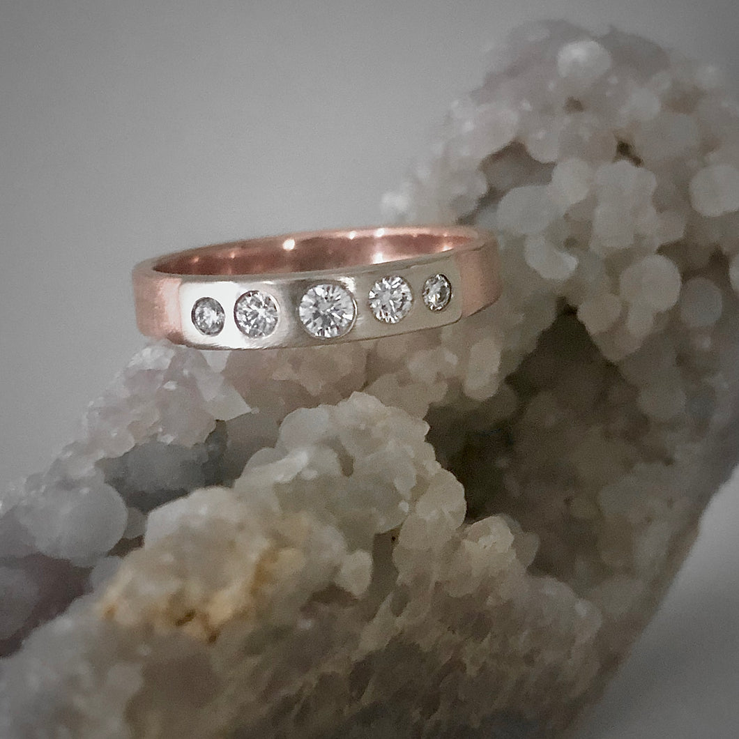 Modern Simplicity: Five-Diamond Rose Gold Ring